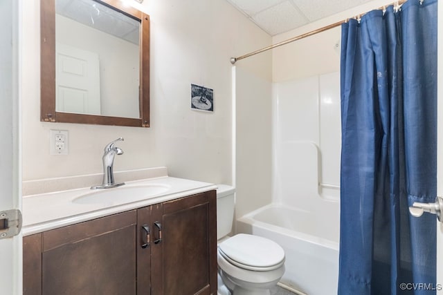 full bathroom with vanity, a paneled ceiling, toilet, and shower / bath combination with curtain