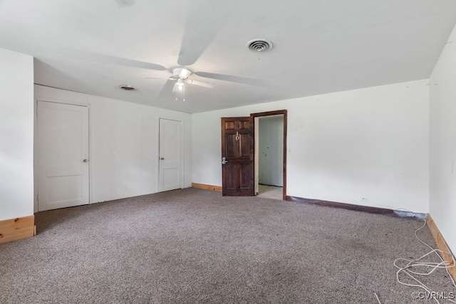 unfurnished bedroom featuring carpet floors and ceiling fan