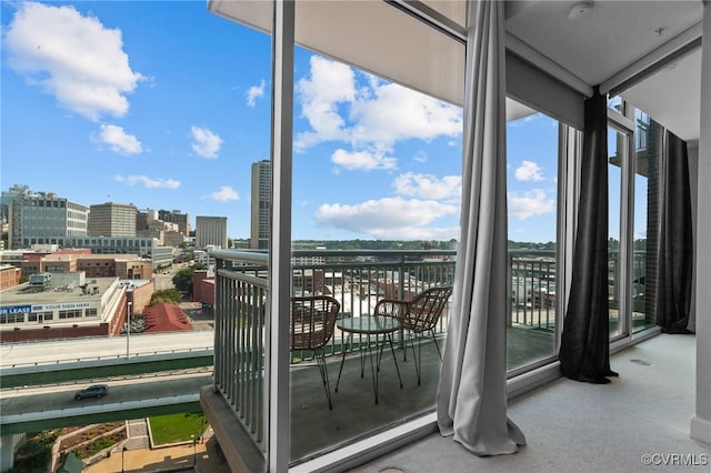 balcony featuring a baseboard radiator