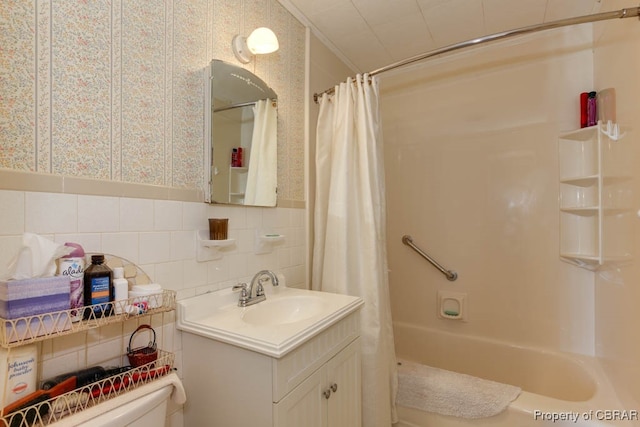 full bathroom with backsplash, shower / bath combination with curtain, vanity, tile walls, and toilet