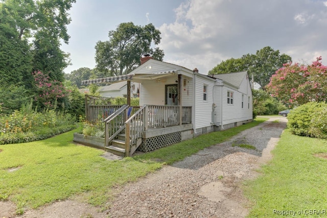 exterior space with a front lawn