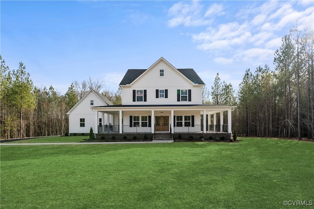 country-style home with a porch and a front lawn