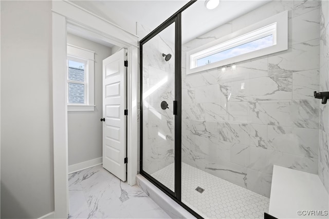 bathroom featuring walk in shower and tile patterned flooring