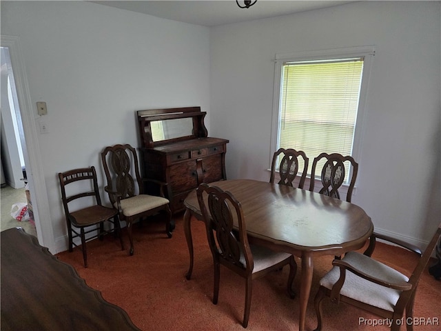 dining area featuring carpet floors