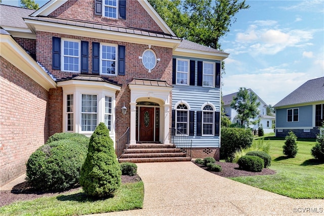 view of front of house featuring a front yard