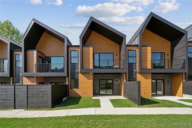 1601 Pulaski St, Richmond, VA 23222 - contemporary home featuring a balcony and brick siding