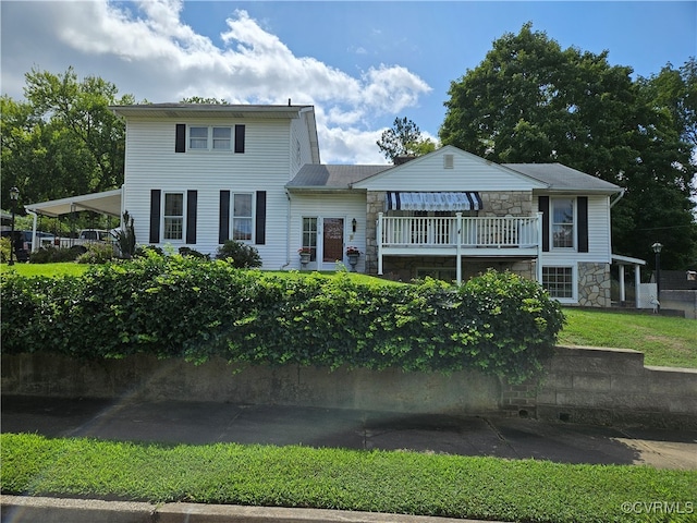 view of front of home with a balcony