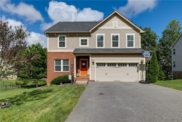 view of front of home with a garage and a front lawn