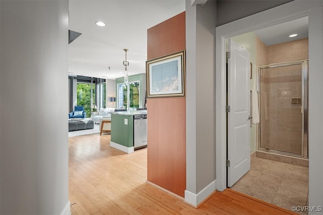 corridor featuring light hardwood / wood-style floors