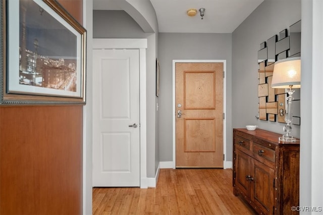 hallway with light wood-type flooring