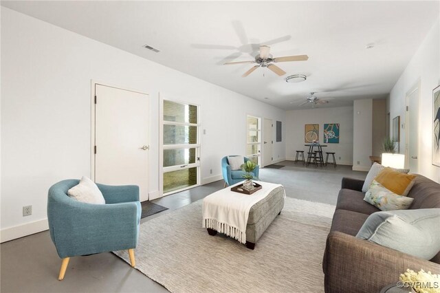 living room with ceiling fan