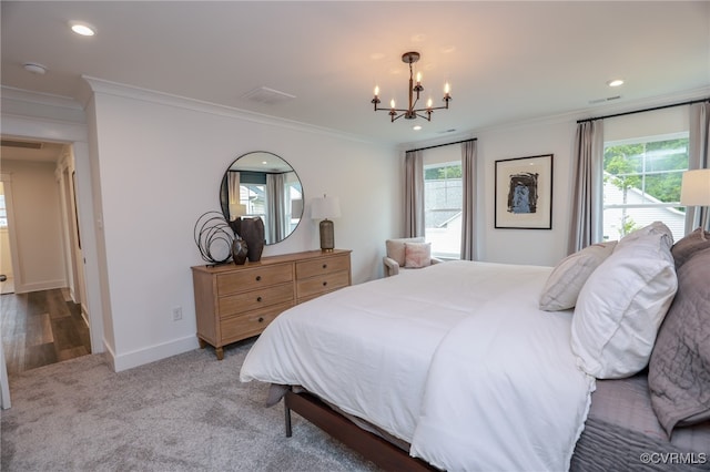 bedroom with wood-type flooring, a chandelier, and ornamental molding