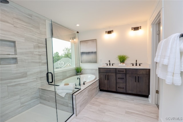 bathroom featuring tile patterned floors, independent shower and bath, and vanity