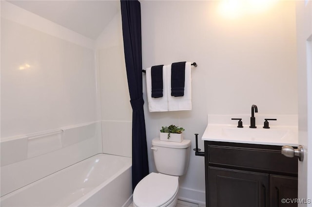 bathroom with shower / tub combo, toilet, lofted ceiling, and vanity