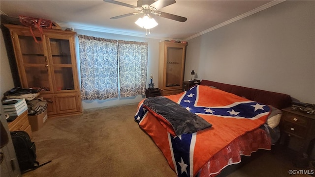 bedroom with ceiling fan, crown molding, and carpet