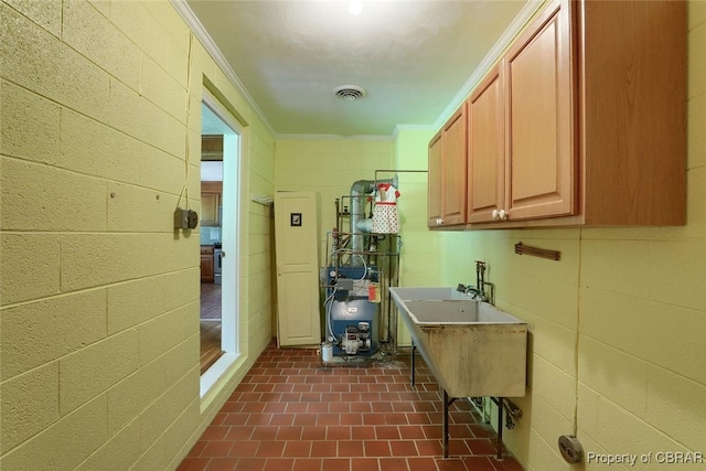 kitchen with sink and crown molding