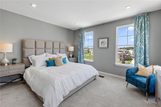 carpeted bedroom with baseboards and recessed lighting