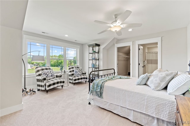 bedroom with carpet, baseboards, recessed lighting, ceiling fan, and a spacious closet