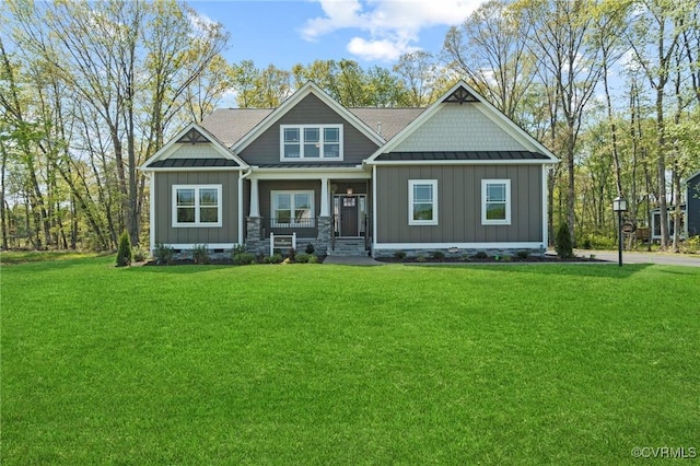 craftsman house featuring board and batten siding, a front lawn, metal roof, crawl space, and a standing seam roof