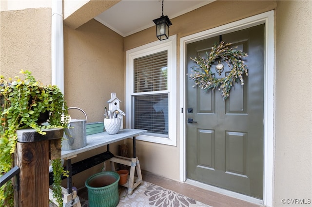 doorway to property featuring a porch