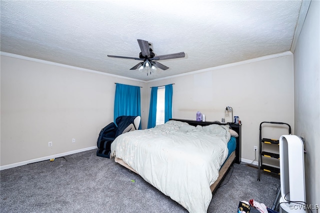 bedroom with a textured ceiling, dark colored carpet, ceiling fan, and crown molding