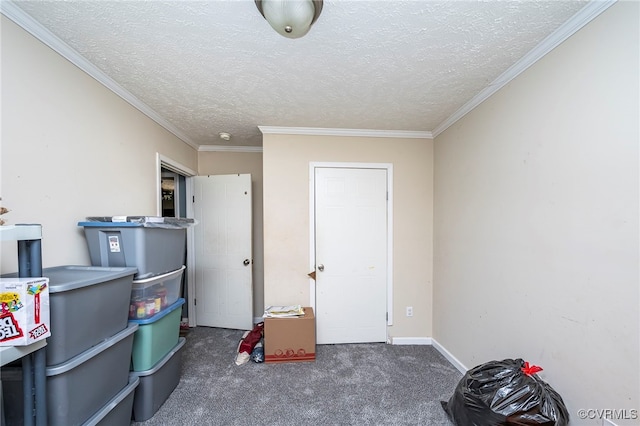 interior space featuring ornamental molding, a textured ceiling, and dark carpet