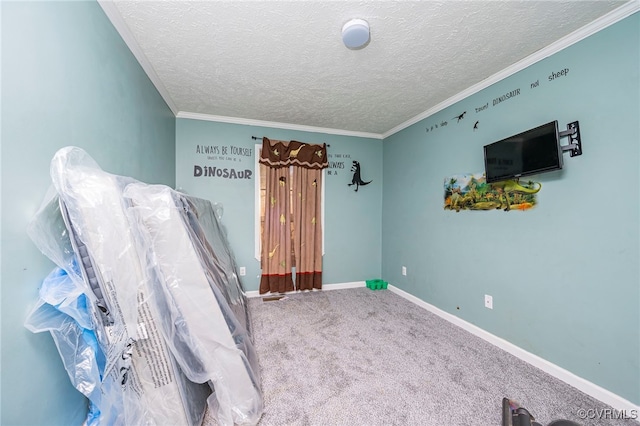 unfurnished bedroom with ornamental molding, carpet, and a textured ceiling