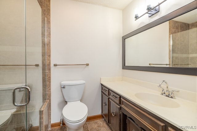 bathroom featuring a textured ceiling, vanity, walk in shower, tile patterned flooring, and toilet