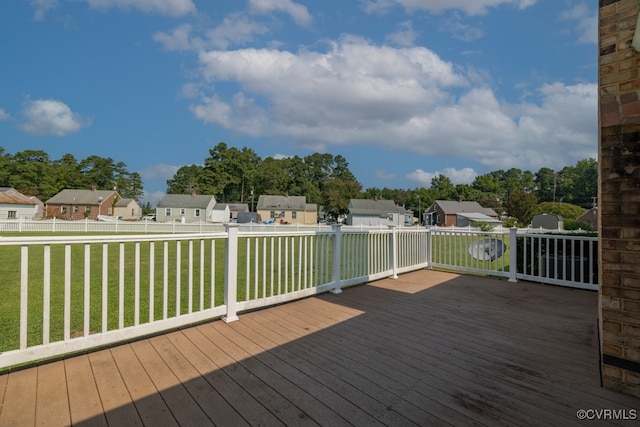 wooden deck with a yard