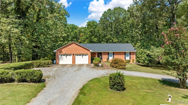 ranch-style home featuring a garage and a front lawn