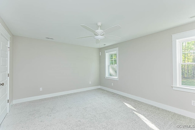 interior space featuring ceiling fan and carpet floors