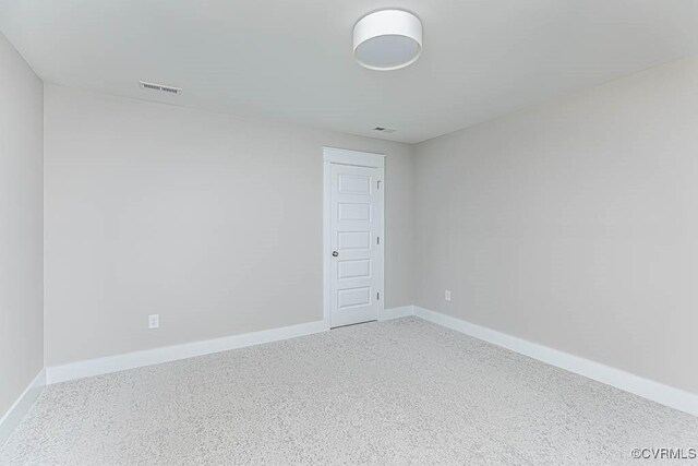 spare room with carpet flooring