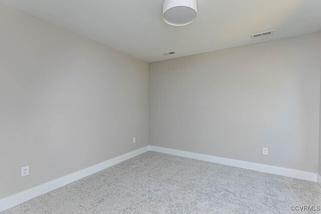 empty room with carpet floors