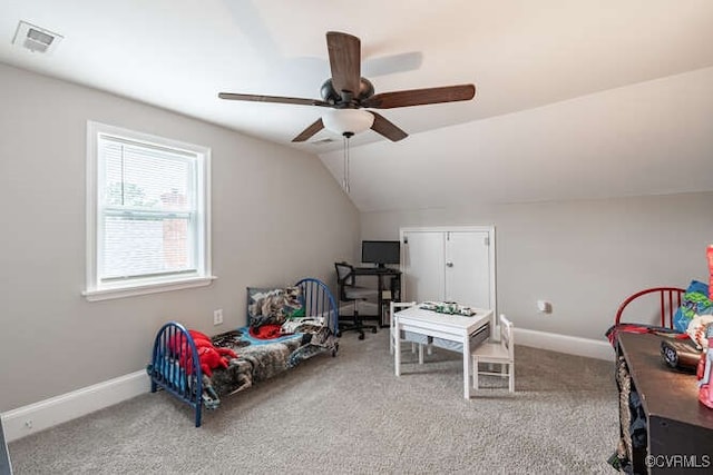 recreation room with lofted ceiling, ceiling fan, and carpet floors