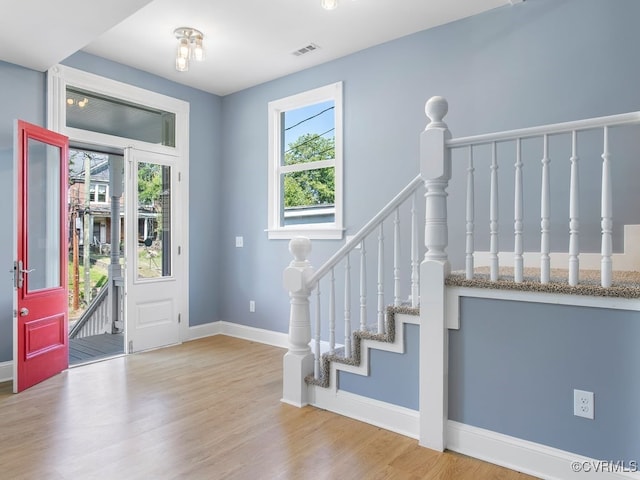 foyer with light wood-type flooring