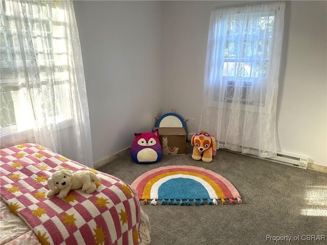 bedroom with multiple windows and carpet floors