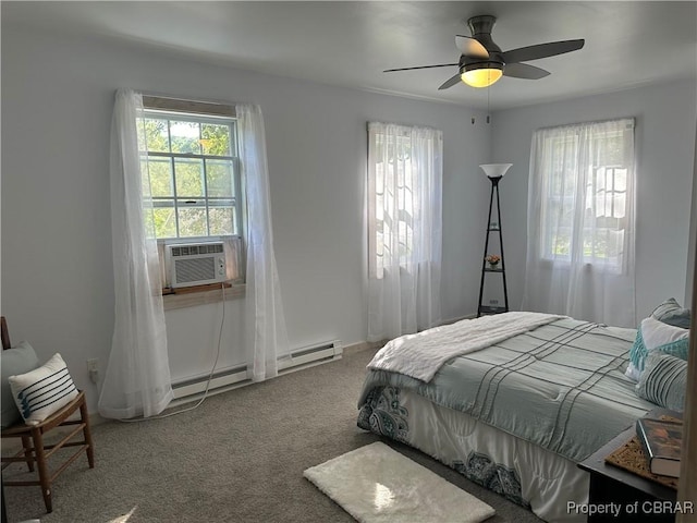 bedroom with carpet flooring, multiple windows, cooling unit, and baseboard heating