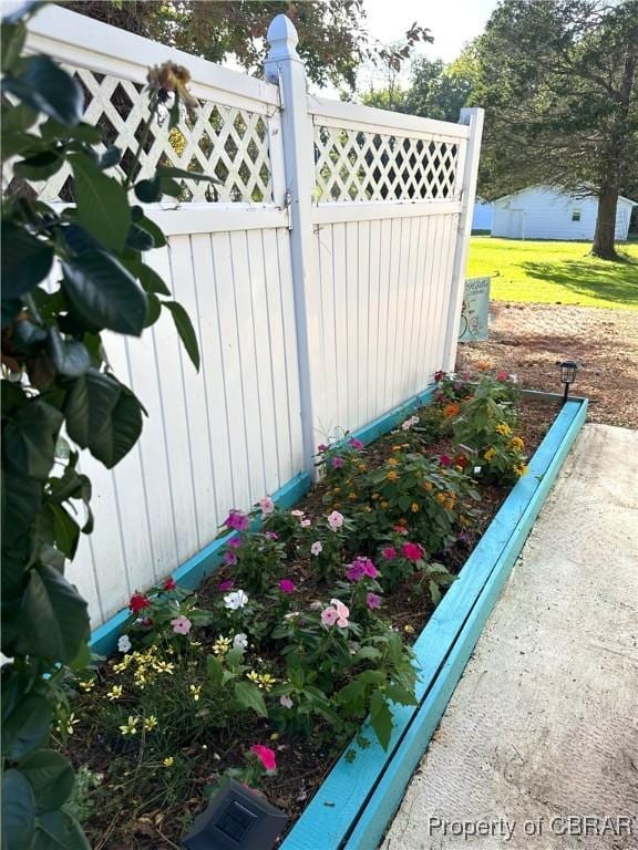 exterior space featuring a gate and fence