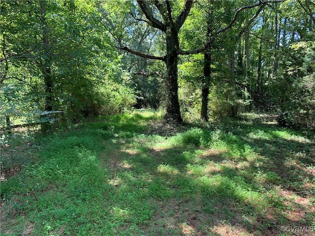 view of landscape with a view of trees