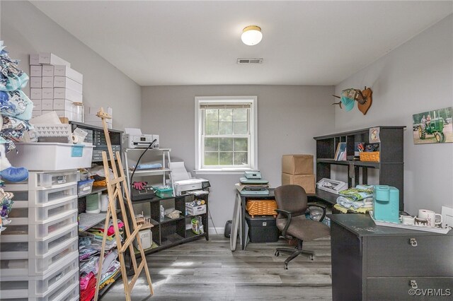 home office featuring hardwood / wood-style floors