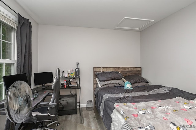 bedroom featuring hardwood / wood-style flooring