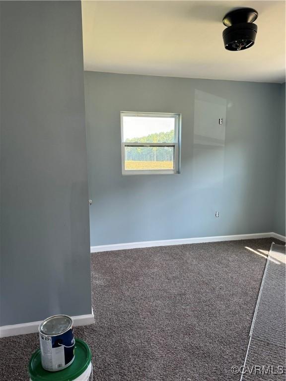 empty room with carpet flooring