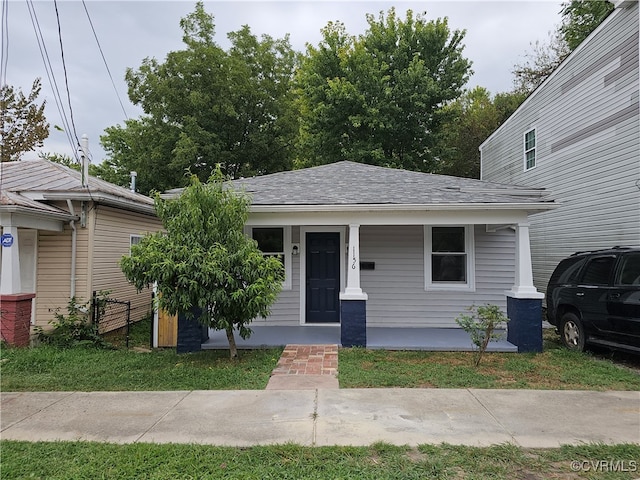 view of front of home featuring covered porch