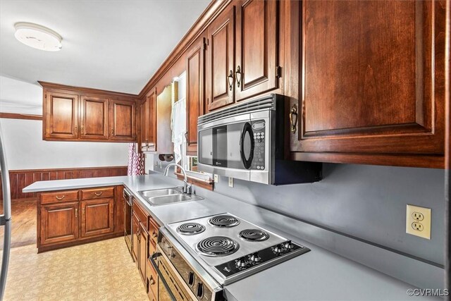 kitchen with appliances with stainless steel finishes and sink