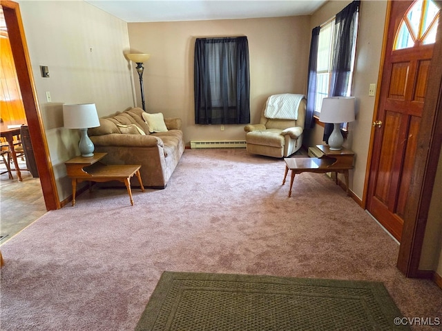 living room featuring baseboard heating and carpet floors