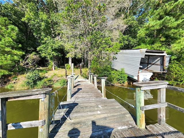 view of dock featuring a water view