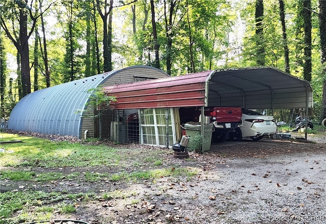 view of outbuilding with a carport