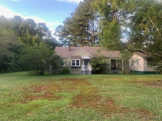 exterior space with a lawn