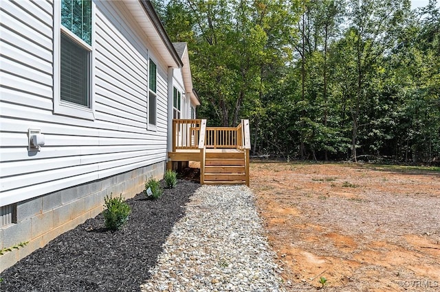 view of yard with a deck