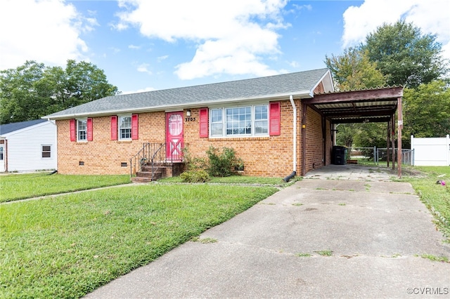 ranch-style house featuring a carport and a front yard